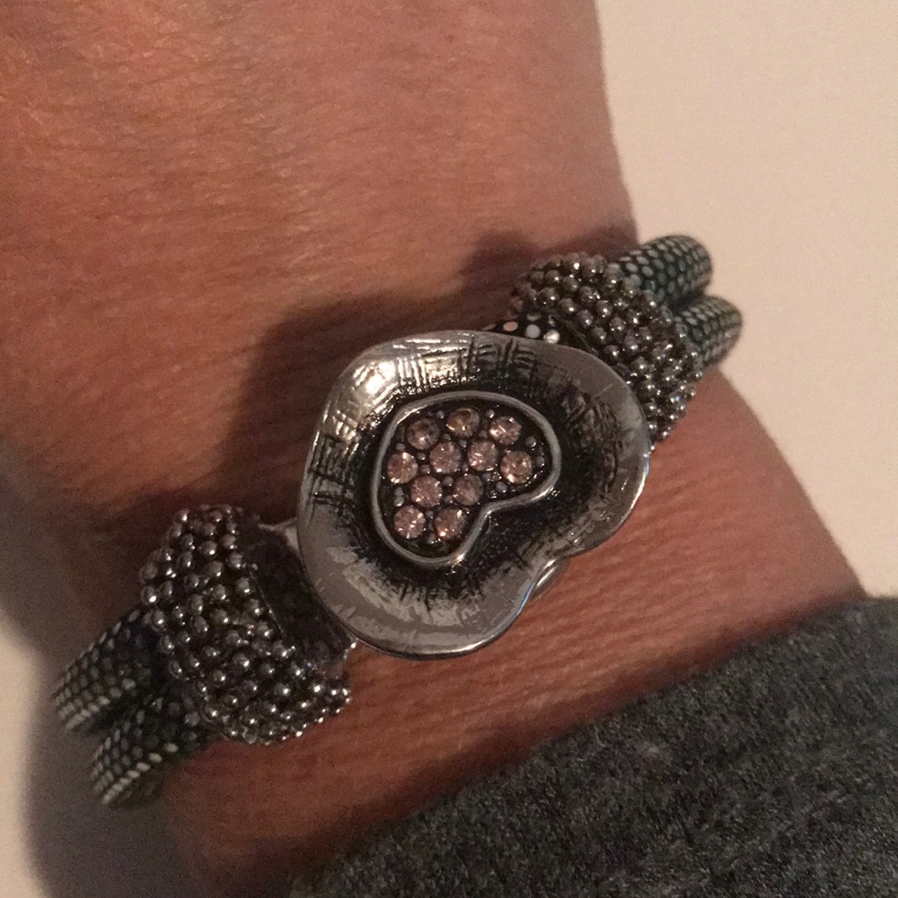 Silver and black rope snap bracelet with snap